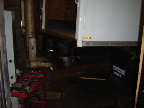 1992 Ford Bronco - Rear view of a white truck bed and chassis with a Supreme mud flap.