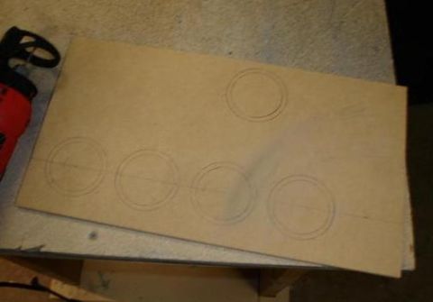 1984 Ford Bronco - A template is laid out with circles drawn for gauge placement.