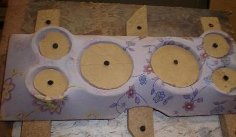 1984 Ford Bronco - This custom dashboard panel features a floral fabric covering and multiple circular openings for gauges.