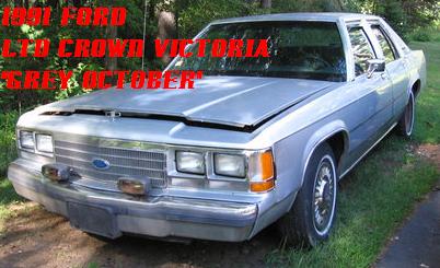 1991 Ford LTD Crown Victoria - This 1991 Ford LTD Crown Victoria is shown from the front with its hood open.