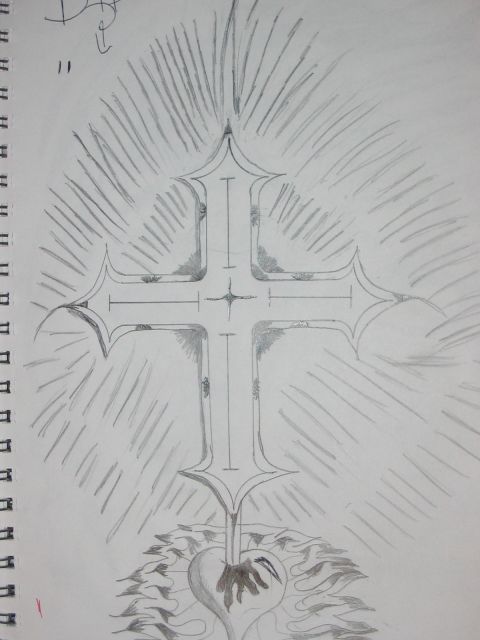 1980 Ford Bronco - A sketch of a cross with a heart motif is depicted on a notebook page, with a website URL visible at the bottom.