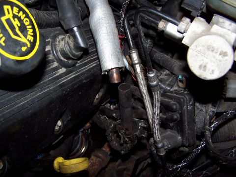 2000 Ford Crown Victoria - Same FUBAR setup at the other end of the tube. The joints were ground and looked like they might have been fluxed . . . in other words the…