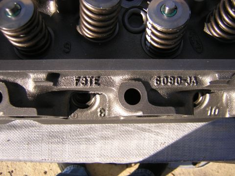 1979 Ford Bronco - Engine cylinder head with visible part numbers F3TE and 6090-JA.