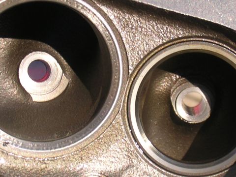 1979 Ford Bronco - This is a close-up view of an engine cylinder head, showing two intake ports with valves.