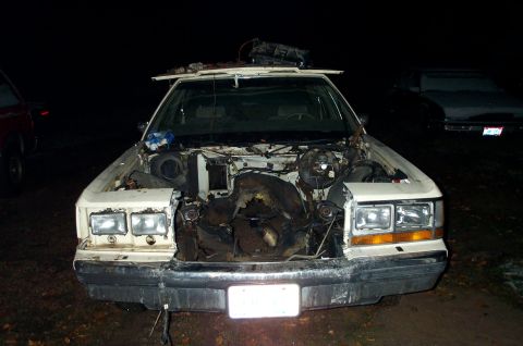 1984 Ford Bronco - an empty space that was cleared out with a blue tipped wrench
