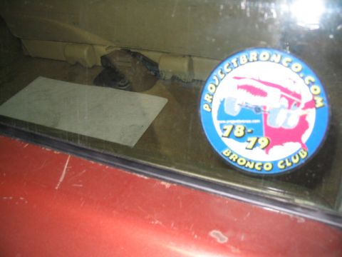 1979 Ford Bronco - A sticker for the Project Bronco Club, indicating years 78-79, is visible on a car window.
