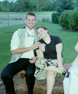 1993 Ford Taurus - A man and woman smile while sitting on a bench outside, with the SuperMotors logo visible at the bottom of the image.