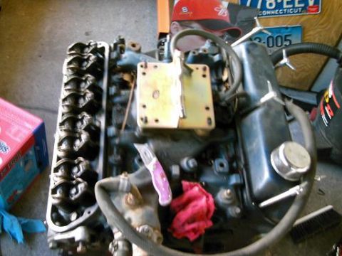 1986 Ford Bronco - Close-up of an engine block, likely removed from a vehicle for repair or modification.