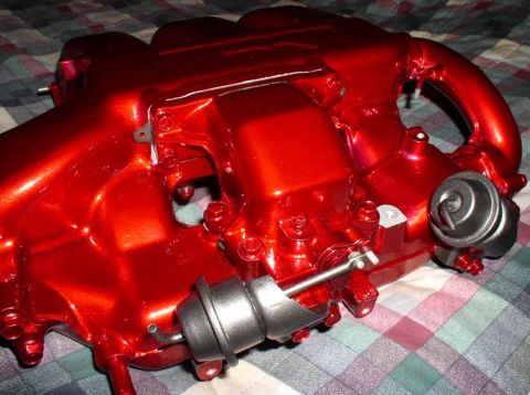 1996 Ford Probe - A shiny red intake manifold with attached actuators is shown, likely a custom part.