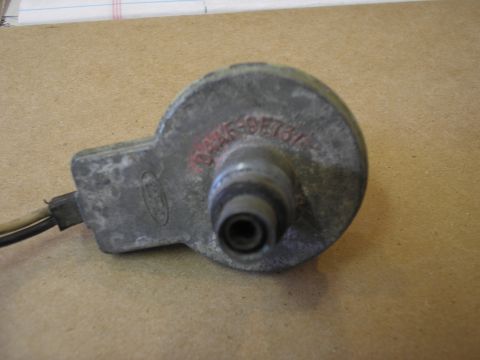 1966 Ford Bronco - A Ford ignition switch housing, part number D4AB-9B737-A, is shown on a neutral surface.