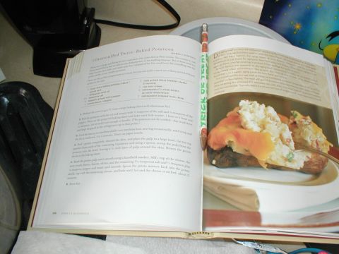1979 Ford Bronco - Cookbook open to a recipe for twice-baked potatoes, with a picture of the finished dish.