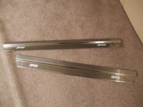 1995 Ford Probe - Pair of aluminum door sill plates, each bearing the "PRO" logo, are shown on a carpeted surface.