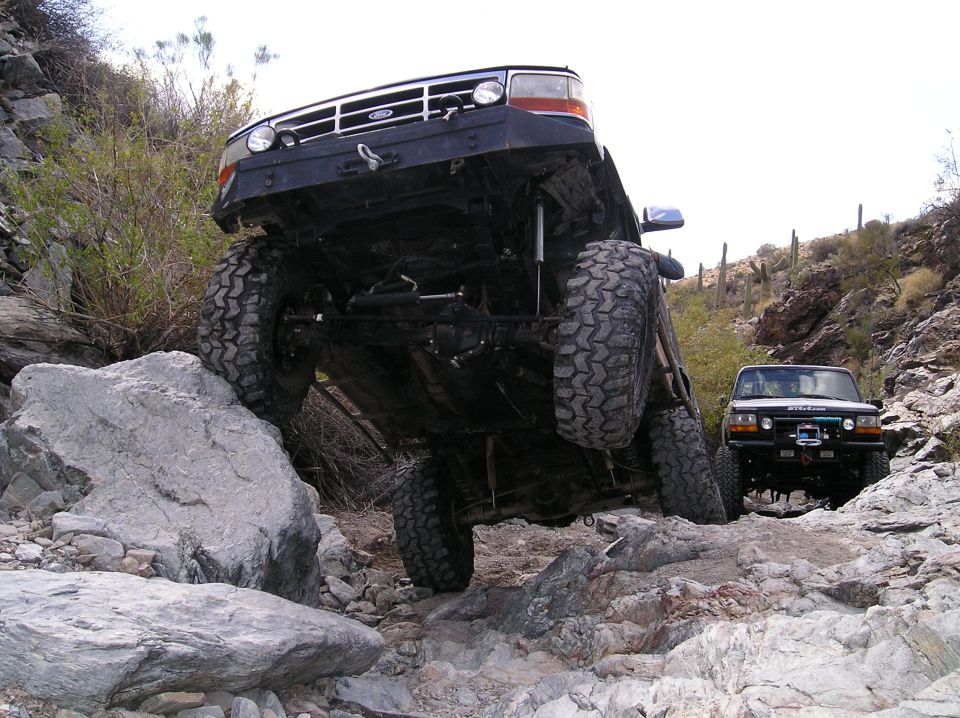 1993 Ford Bronco climbing rocks, front view