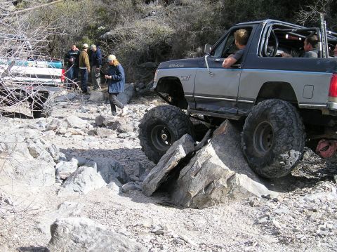 1993 Ford Bronco - This modified 1993 Ford Bronco tackles a challenging rocky trail with impressive articulation.