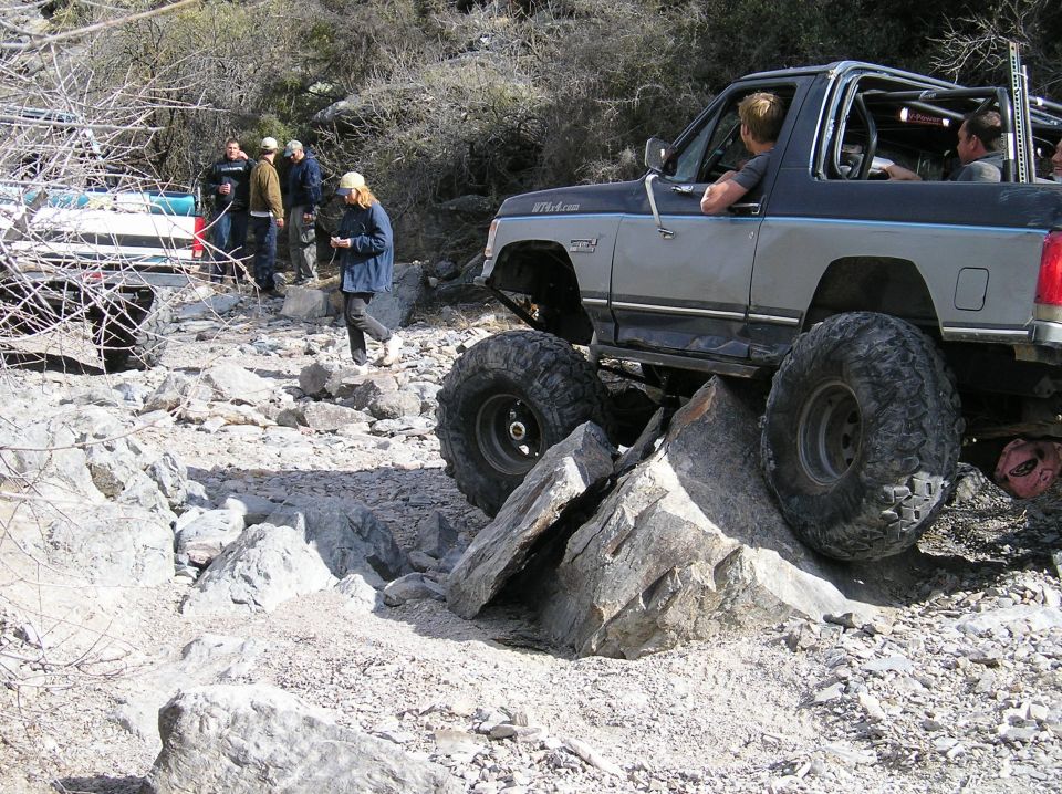 1993 Ford Bronco navigating rocky terrain