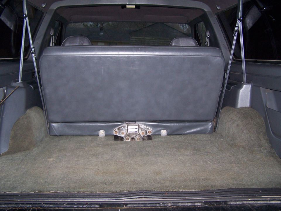 Interior cargo area of a 1992 Ford Bronco with folded rear seat