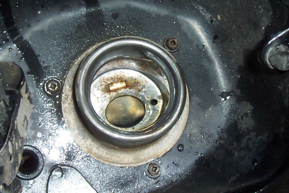 Close-up of a vehicle's fuel filler neck opening