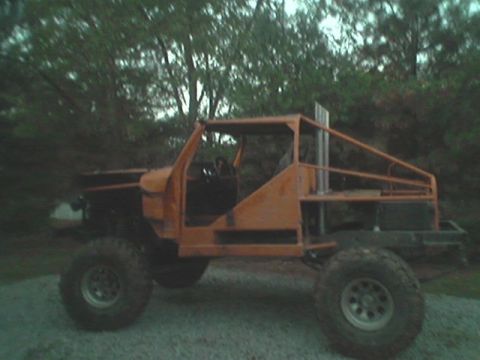 1979 Ford Bronco - This heavily modified vehicle has a custom roll cage and a tall exhaust pipe, suggesting it's built for off-road use.