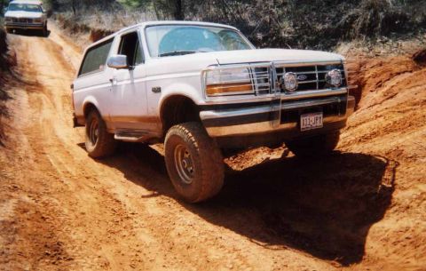 1995 Ford Bronco - Wheel's off the ground in this pic, but you can't really see it very well. It's the passenger side front wheel.
