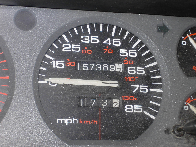 1993 Jeep Cherokee instrument cluster showing 157,389 miles and 1732 trip meter