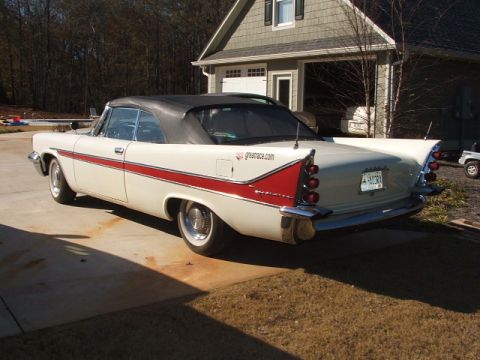 1966 Ford Ranchero - Rear view of a 1957 DeSoto Firedome convertible with its distinctive tail fins.