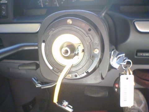 1994 Ford Bronco - The steering column clock spring is visible with keys in the ignition of a 1994 Ford Bronco.