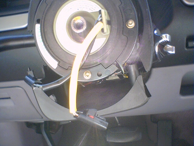 Clock spring assembly with yellow wire and connector