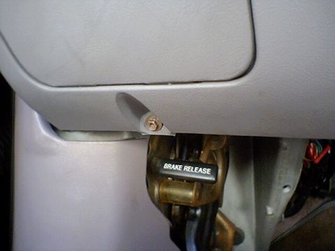 1994 Ford Bronco - Close-up of the interior brake release lever, showing the text "BRAKE RELEASE".