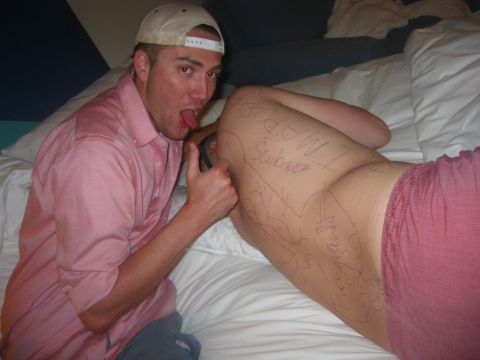 1989 Ford Bronco - A person lies on a bed with drawings and text scribbled on their leg.