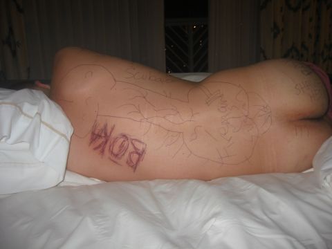 1989 Ford Bronco - A person's back is covered in various drawings and text, including the word 'Boka'.