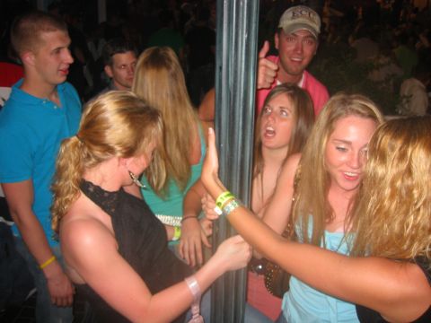 1989 Ford Bronco - Girls dance on poles for no reason in Port Lucaya.