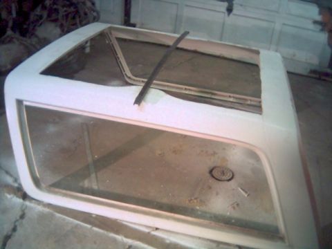 1986 Ford Bronco - Beginning stage of custom soft top. Black piece is going to be attached as a center bow to keep the vinyl from flapping.