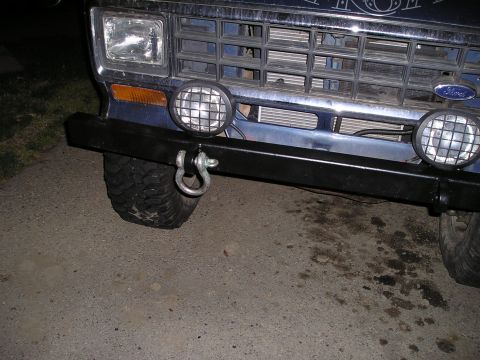 1986 Ford Bronco II - Front view of a 1986 Ford Bronco II, highlighting its heavy-duty bumper and auxiliary lights.