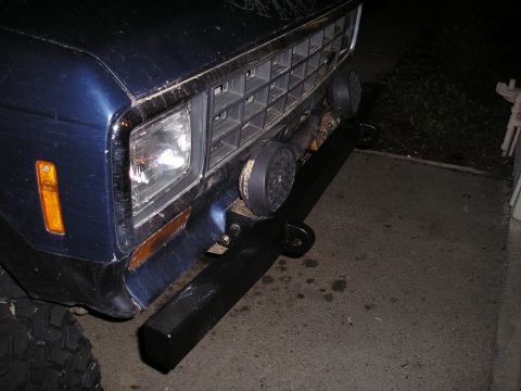1986 Ford Bronco II - Front view of a 1986 Ford Bronco II, showing the bumper, grille, and headlights.