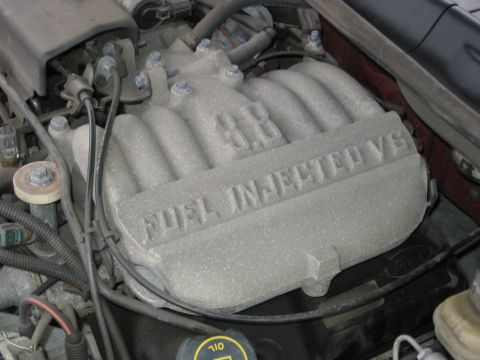 1995 Ford Thunderbird - Close-up of a 3.8L V6 fuel injected engine intake manifold.