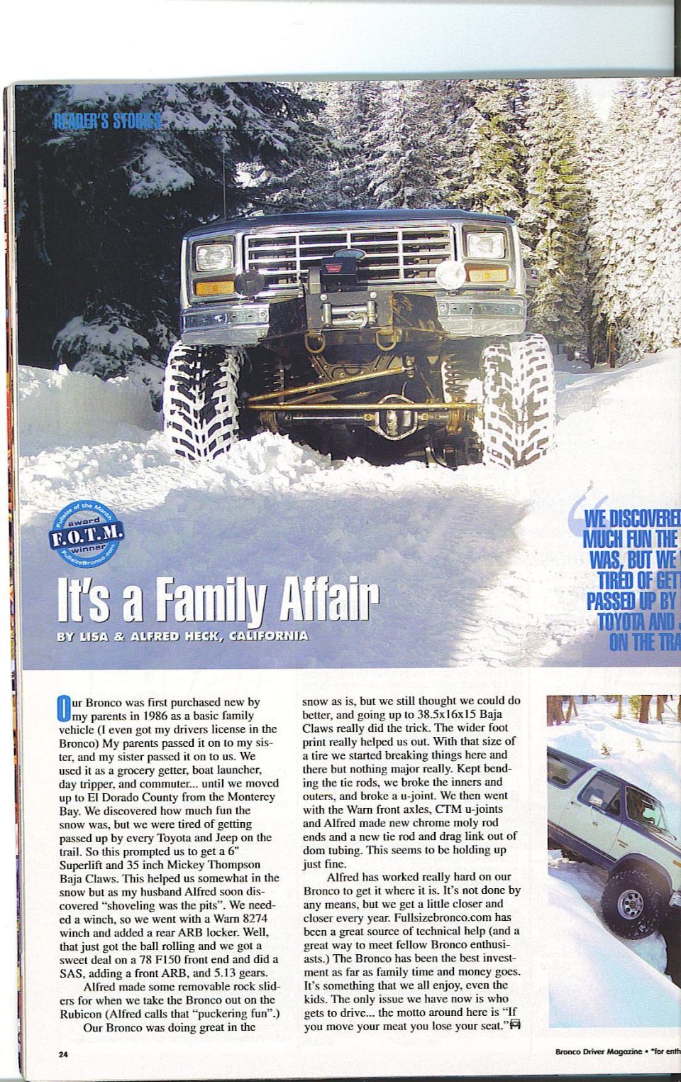Front view of a lifted 1980s Ford Bronco with large tires and a winch, in a snowy forest