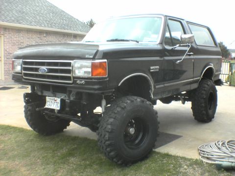1991 Ford Bronco - This lifted 1991 Ford Bronco has a custom front bumper and large off-road tires.