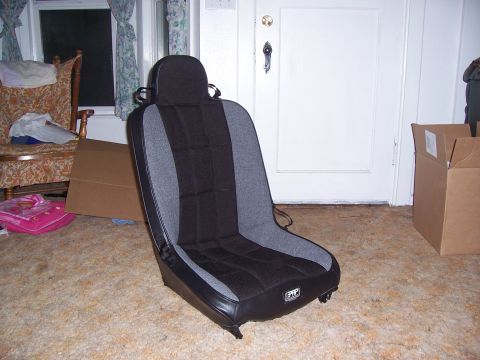 1988 Suzuki Samurai - Aftermarket racing seat with "PRP" logo shown indoors.