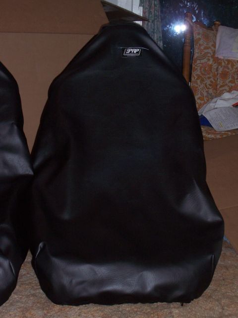 1988 Suzuki Samurai - Black PRP seat covers are shown, with a logo visible on the top of one cover.