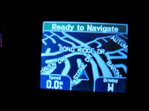 2000 Ford Taurus - 2000 Midnight Black Ford Taurus SES 4-Door Sedan - Garmin Streetpilot i5 GPS at night from TheGPSStore.com