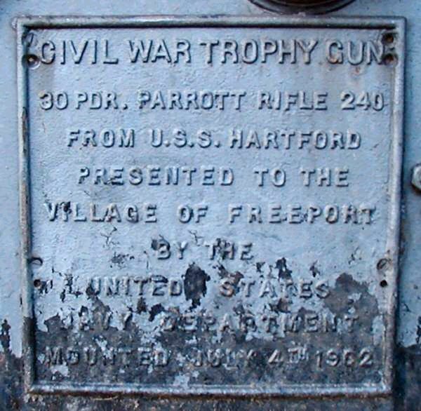 Plaque reads 'Civil War Trophy Gun, 30 Pdr. Parrott Rifle 240 from U.S.S. Hartford, Presented to the Village of Freeport by the United States Navy Department, Mounted July 4th 1962.'