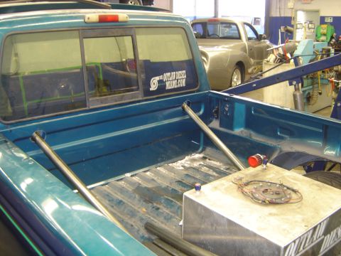 1997 Ford Ranger - Rear view of a 1997 Ford Ranger pickup truck bed, modified with an auxiliary fuel tank.