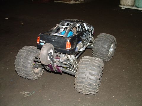 1994 Ford Bronco - This RC monster truck has oversized tires and custom flame graphics on the body.