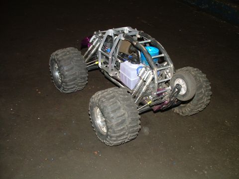 1994 Ford Bronco - This remote control rock crawler features large off-road tires and a visible engine.