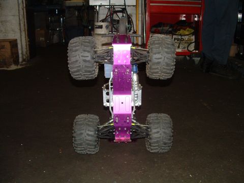 1994 Ford Bronco - This remote-controlled monster truck has a purple chassis and large, knobby tires.