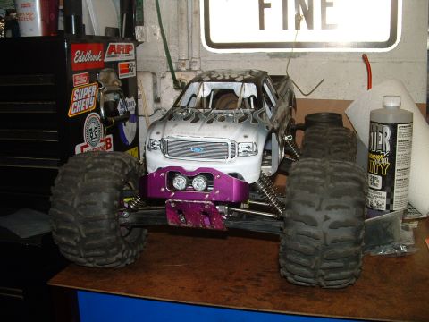 1994 Ford Bronco - This RC truck has a Ford grille and flame decals, but does not match the claimed 1994 Ford Bronco.