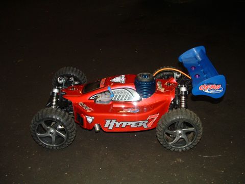 1994 Ford Bronco - This remote control buggy has "Hyper 7" written on its side and a blue rear wing.