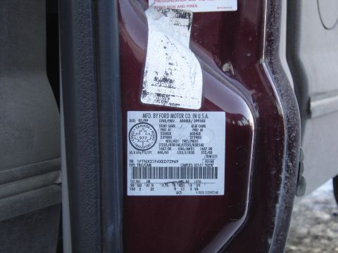 1988 Ford Bronco - This is a close-up of a vehicle's door sticker, detailing manufacturing information and specifications.