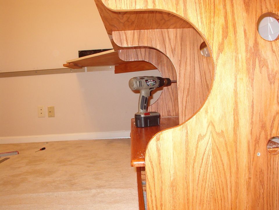 This veneer is paper-thin, and very easy to peel off when cutting, but the stain hides the flaws fairly well.  Next time, I'll know to shop for either TRUE oak plywood, or at least some with a MUCH thicker veneer.
