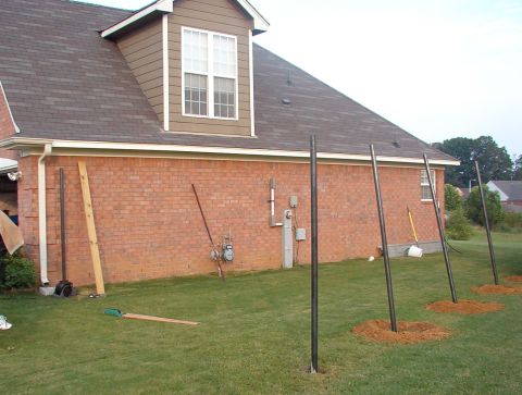 2004 Land Rover Land Rover - The hole by the house was the worst because the auger kept hitting the slab, and every time it bound up, my knuckles hit the bricks. I'm su…